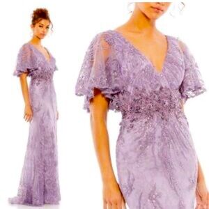 Stunning dress with flutter sleeve